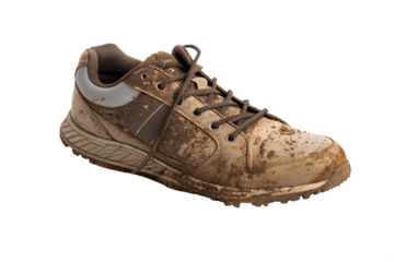 Realistic shoe covered in mud, isolated on a white background. Perfect for concepts related to outdoor adventures, dirty work, hiking, cleaning products, or rainy weather. Ideal for advertising, educa