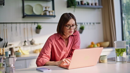 Tired freelancer working home office closeup. Businesswoman closing computer