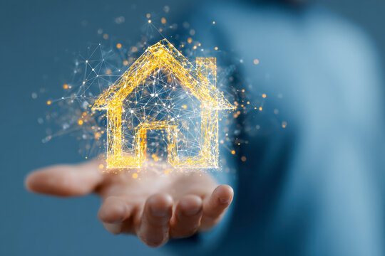 Futuristic network digital house hologram glowing above open hand symbolizing smart home technology and innovative real estate solutions in modern living - Powered by Adobe
