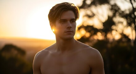 A cinematic, ultra-realistic portrait captures a thoughtful young man, shirtless, bathed in the warm, golden glow of a beautiful sunset, evoking natural beauty and serene contemplation