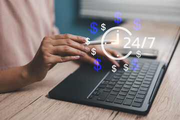 Person working on laptop with 24/7 money symbol, representing online business automation, passive income, and digital marketing productivity in modern technology