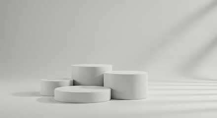 Four white round podiums isolated on white background for product display, a minimal, modern display platform (dais/pedestal) for product or presentation visuals