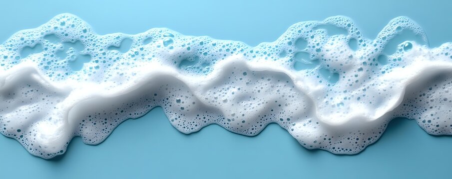 Soap foam bubbles wave on blue background, realistic white shampoo or detergent froth texture with small bubbles for cleaning and washing design.