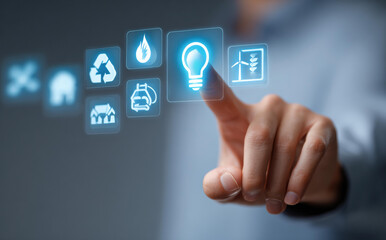 Obraz premium Person hand touching futuristic technology icon for energy sustainability. innovation shows concept for future power and environment management with hopeful feeling