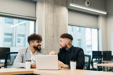 Diverse startup business partners discussing project ideas