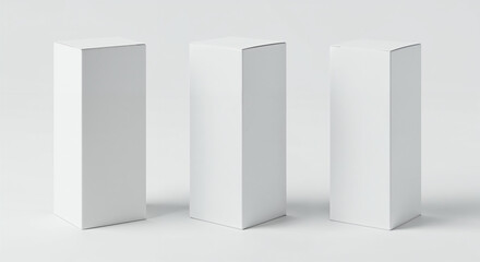 Three blank white rectangular boxes arranged on a light gray background packaging empty