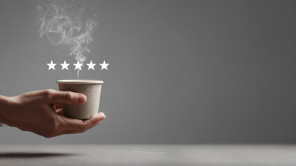 Hand holding a hot drink with five stars rating, expressing high quality and satisfaction
