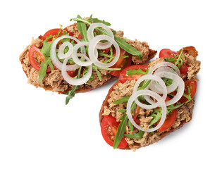 Delicious bruschettas with tuna, tomatoes, onion and arugula isolated on , top view
