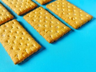 close up of cookies on blue background