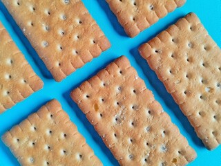 close up of cookies on blue background