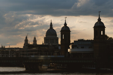 St Pauls Cathedral and city skyline silhouette at sunset in London