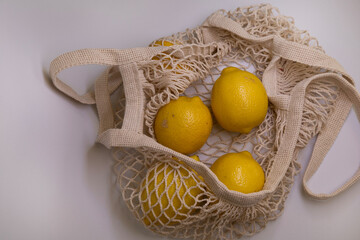 Trendy Lemon Flat Lay for Branding – Minimal Aesthetic with Mesh Bag