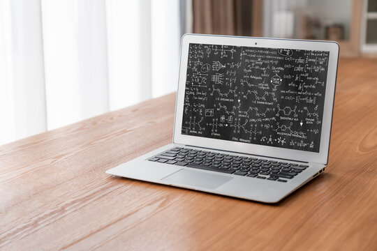 Mathematic equations and modish formula on computer screen showing concept of science and education