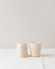 Handmade ceramic coffee and espresso cups made in the slip casting method of pottery