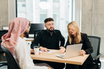 Business people discussing project ideas in modern office