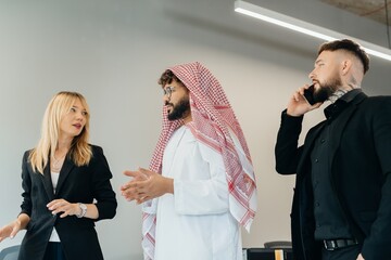 Business partners discussing global strategy in modern office
