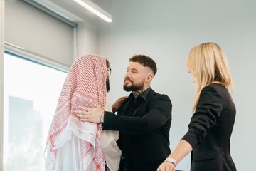Diverse business professionals greeting each other at meeting