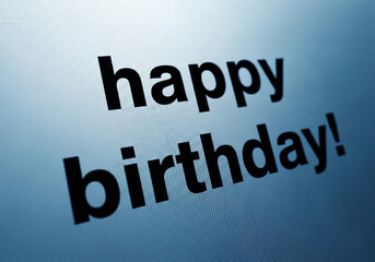 Happy birthday greeting card with black text on a blue background