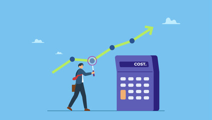 Smart businessman using magnifying glass to analyze cost chart with calculator. Cost management or expense analysis, business strategy to analyze and reduce cost to gain more profit.