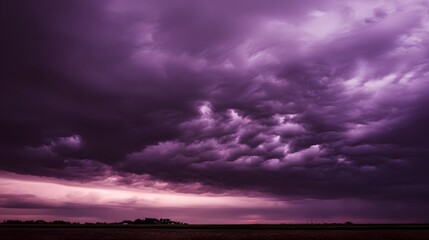 midgard. Dark purple storm clouds gathering before rainfall, dramatic sky formation, natural weather phenomenon. travel magazines, destination branding, designed for travel destination branding.