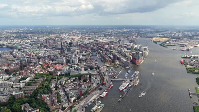Aerial view of Hamburg, Germany, showing bustling cityscape with famous port, Elbe river, and modern architecture