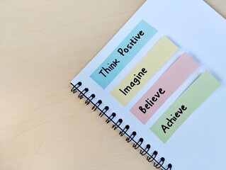 Hand written message on colorful sticky note as a self esteem building concept, flat lay 