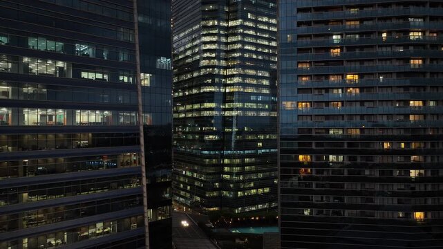 twilight time illuminated singapore city downtown office buildings front aerial panorama 4k 