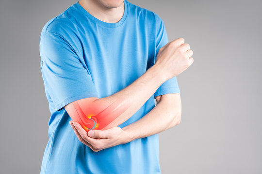 Diseases of the elbow joint, bone fracture and inflammation, man suffering from pain in cubit