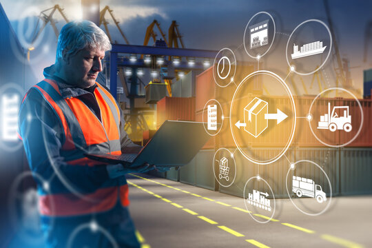 Logistics management at port with worker in safety vest using laptop, overseeing cargo containers and digital icons of supply chain, transport, and warehouse operations.