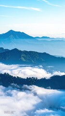 Mountainscape's Mist: The majestic landscape unfolds with layers of mountains, enveloped in a soft, ethereal mist under a clear, bright sky. A symphony of nature's beauty and tranquility.