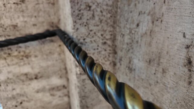 A macro of ornate golden railings showcasing intricate craftsmanship