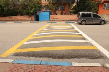 A modern speed bump model designed to reduce vehicle speed safely without damage. Ideal for...