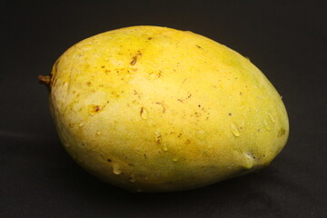 mango isolated on black