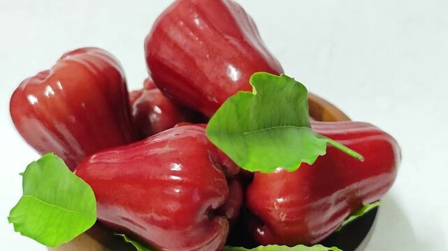 Juicy red rose apples isolated on white background. 