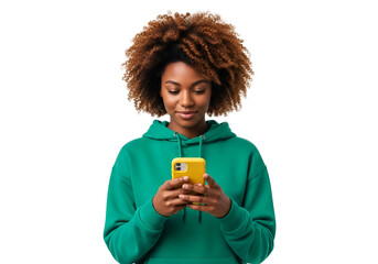 Happy African American woman in a green hoodie, looking at her yellow smartphone, portraying digital connectivity and mobile technology, isolated on transparent background.
