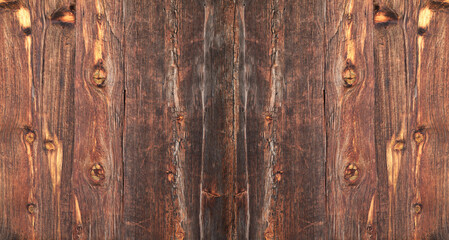 Fototapeta premium Texture of brown aged weathered board. natural retro, vintage Background. empty Copy space. Aged striped dark wood pattern. old wooden texture backdrop for you design Front top view