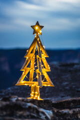 Rustic timber Christmas Tree on a cliff in Blue Mountains