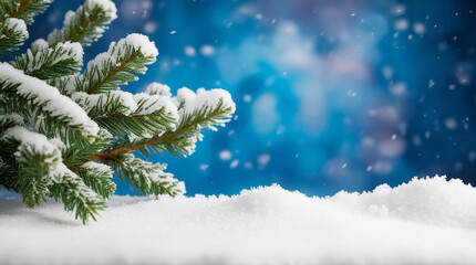 Winter background with beautiful fir branch and falling snow. Template for Christmas and New Year cards and banners. Copy space.