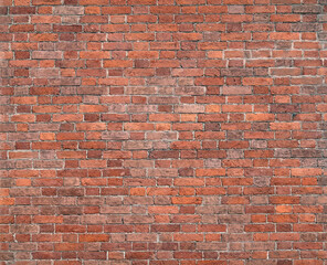 Old retro style red wall from brickwork as background front view closeup