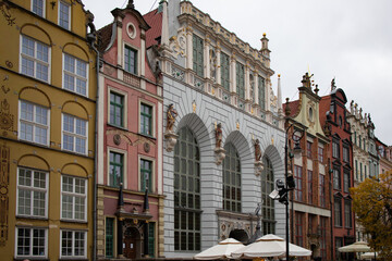 Facade of colorful historic houses on the Long Market street in Gdańsk Old Town, Poland