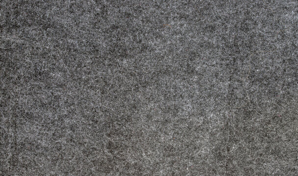 Dark gray felt fabric texture background