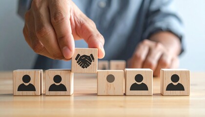 Build your team with partnership and collaboration for success, hand completing the team with a handshake, hiring and recruitment concept for business