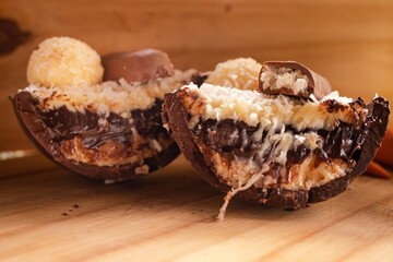 A rich and indulgent chocolate spoon egg layered with creamy filling and drizzled with caramel and chocolate. Topped with crunchy walnuts, it offers a perfect balance of texture and flavor, ideal for 
