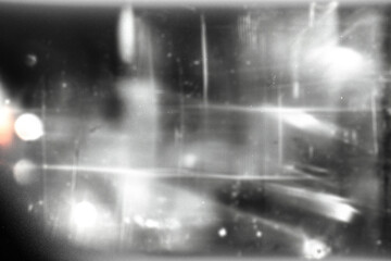 retro film overlay effect with scratch dust and motion blur light leaks,retro grain noisy film distressed texture light leak flare on black background,grunge film background,old film burn texture