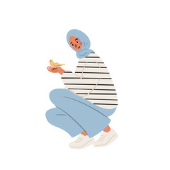Flat vector illustration of Muslim woman in hijab and striped sweater. Female character crouching, gently holding small bird in hands. Kind interaction with nature, modern lifestyle person.