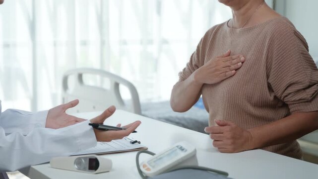 Patient Consultation for Chest Pain Diagnosis Medical Office Health Examination Clinical Environment Close-up View Health Awareness