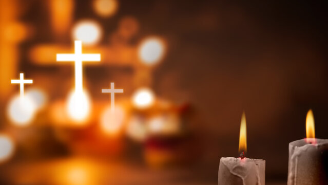 Light of the Christian cross with candlelight and blurred bokeh light background. Concept of Christianity, religious, faith, Jesus, or belief - Powered by Adobe