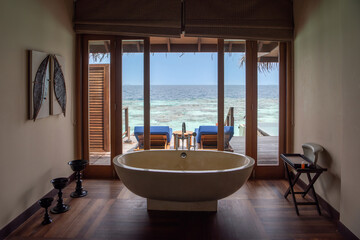 Tranquil closeup calm sea water waves with palm trees. Beautiful Panorama, Tropical island beach landscape exotic shore coast. Summer vacation, holiday amazing nature. Relax paradise, Maldives.