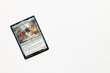 Obraz premium Bradford, UK Nov 3 2025 Doc Ock, Sinister Scientist card from Spider-man magic the gathering card shot isolated on a white paper background.