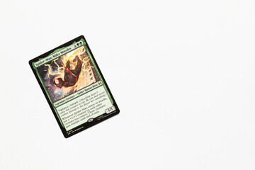 Naklejka premium Bradford, UK Nov 3 2025 Spider-man, Miles Morales card from the Spider-man magic the gathering card game shot isolated on a white paper background.